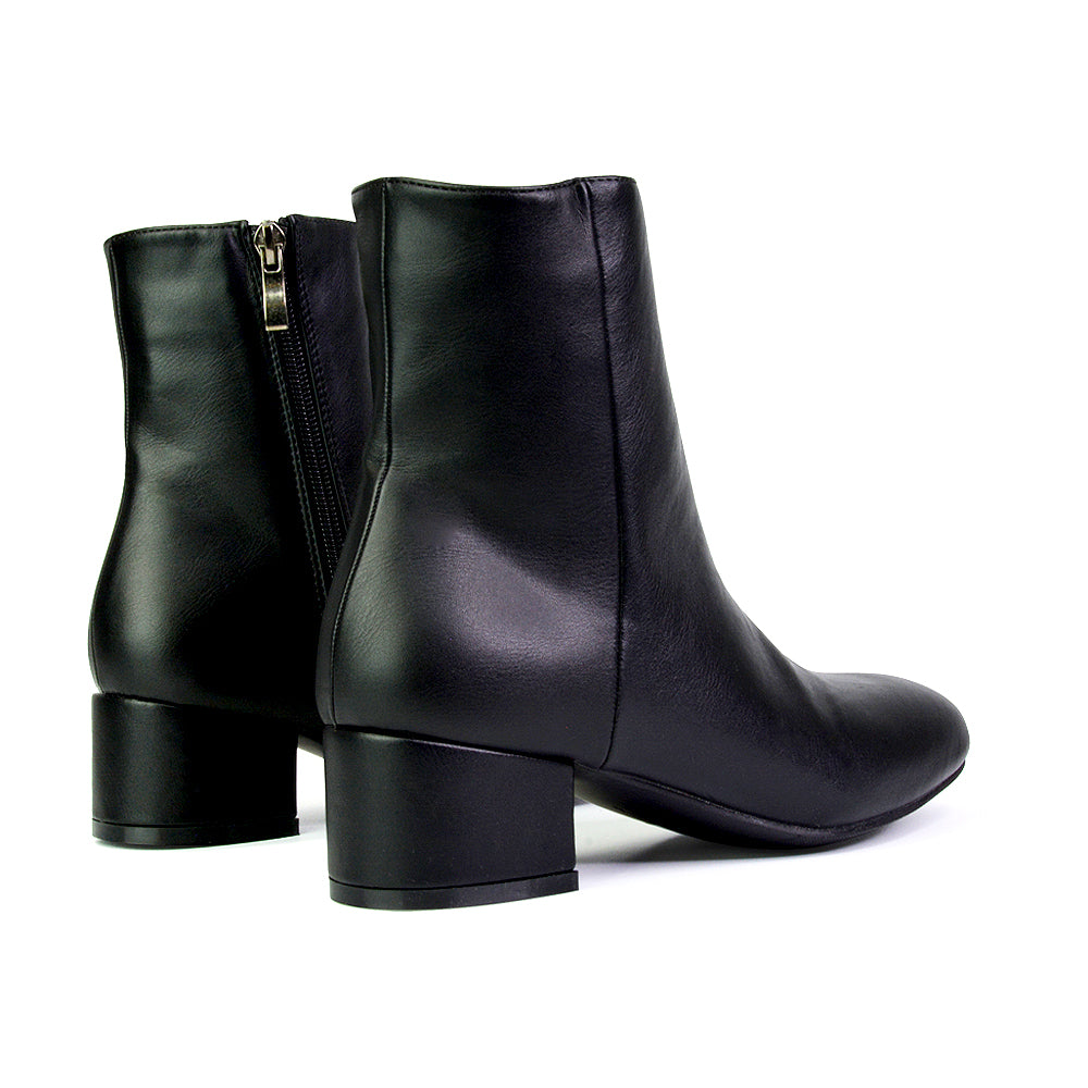 black women’s ankle boots with low comfortable heel, women’s black Chelsea boots for work, black Chelsea boots for women with side zip closure, women’s black ankle boots for jeans and dresses