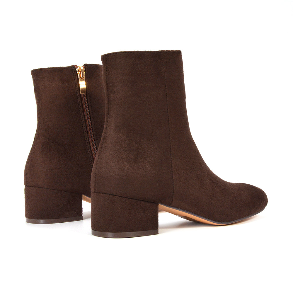 comfortable brown Chelsea boots for everyday wear, brown ankle boots with low heel and side zip, versatile brown Chelsea style boots for women, women’s brown casual low heel ankle boots