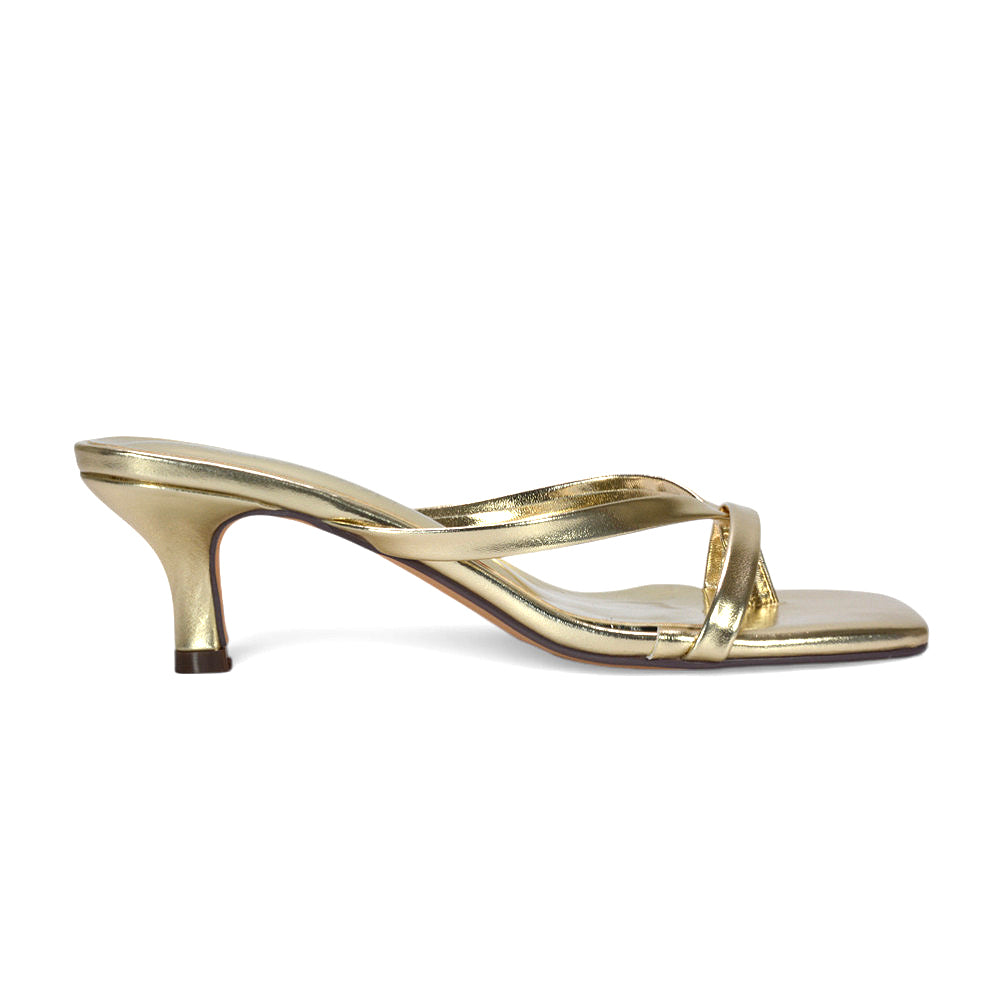 women’s gold mule heels, gold wedding guest sandals, elegant gold low heel sandals for weddings, trendy gold sandals 2026