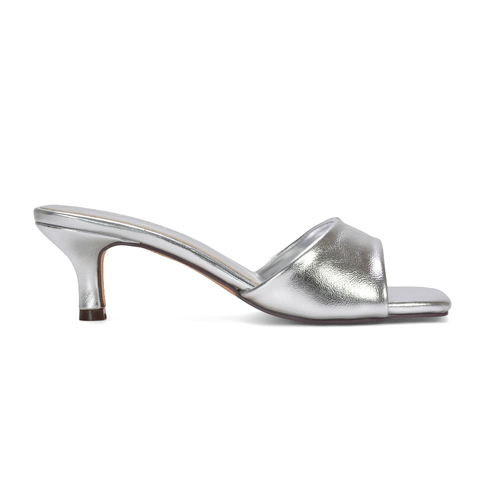 women’s heeled mules, women’s dressy sandals low heel, synthetic leather slip on mule heels, party wear kitten heels, silver summer heels, silver party heels