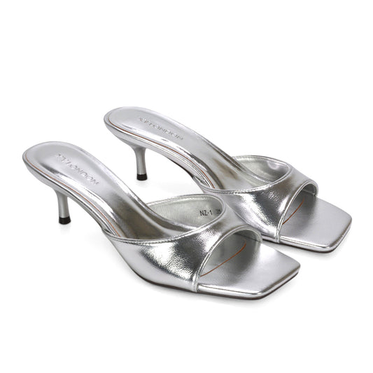 slip-on heeled sandals, chic open toe kitten heel mules, sleek slip-on stiletto mules, silver slip on stiletto heels, silver mid heel mules