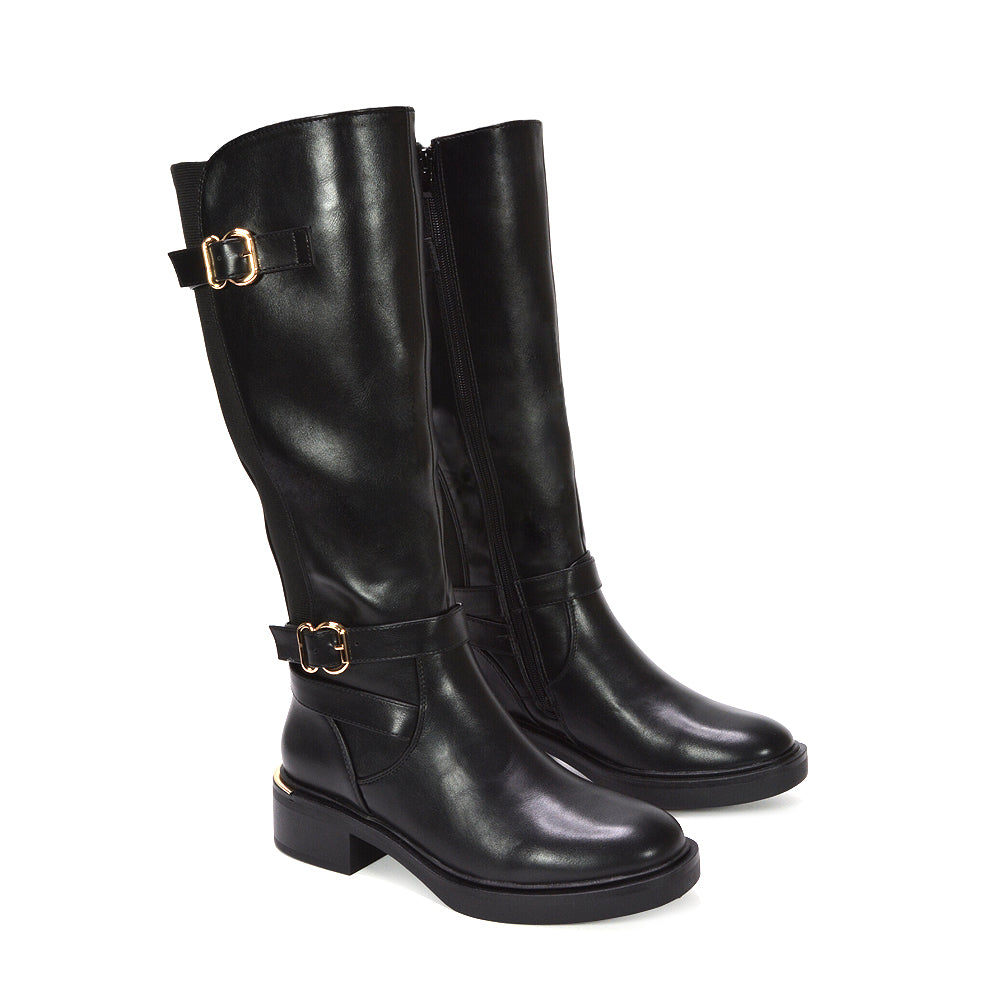black zip up boots, black buckle boots, riding style boots, everyday wear boots, versatile winter fashion boots for ladies