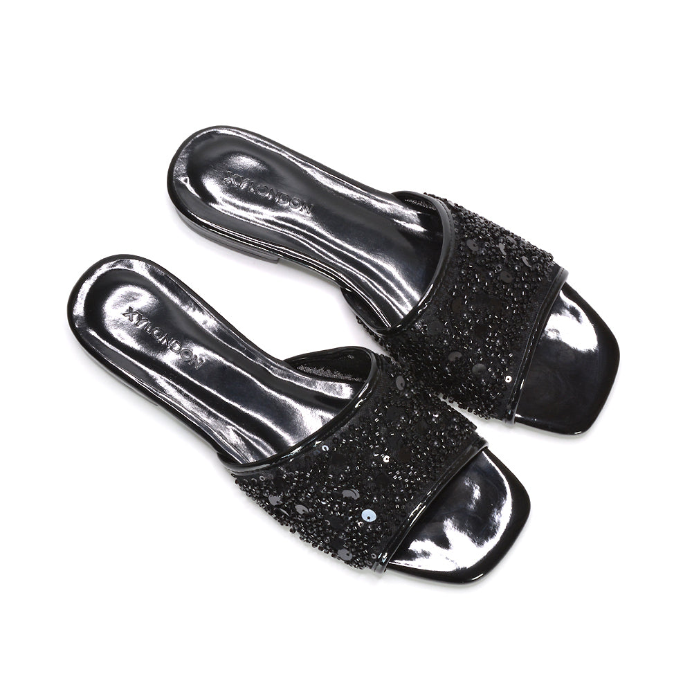 statement black sparkly sandals, black prom flat sandals, black resort wear sandals, comfortable black slip on sandals for holidays, black open toe sandals, black glitter sandals women