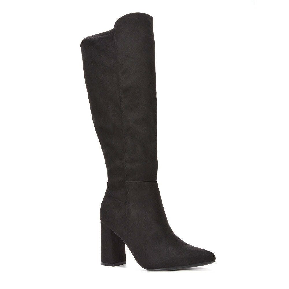 suede boots, high heel knee boots, women’s heeled knee boots for winter outfits, stylish boots for date night, sleek silhouette high boots, trending tall boots for women, black block heel boots, stylish black tall boots with block heel, black heeled boots for evening outings, black tall boots fall fashion trend