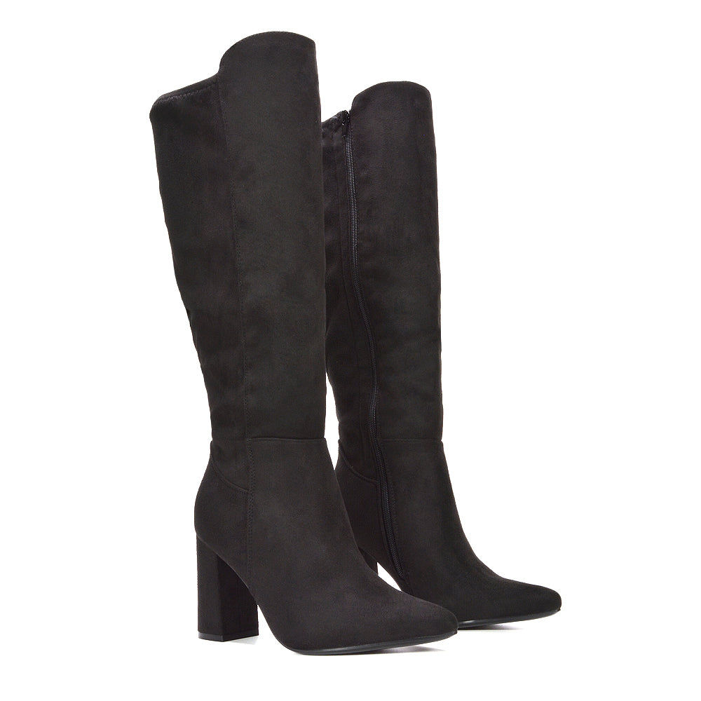 best black boots for cold weather outfits, black tall boots for date night outfits, women’s black heeled boots for winter outfits, women’s black tall boots, must-have winter footwear, sturdy block heel long boots, tall boots for winter parties, tall boots with comfortable block heel, block heel tall boots