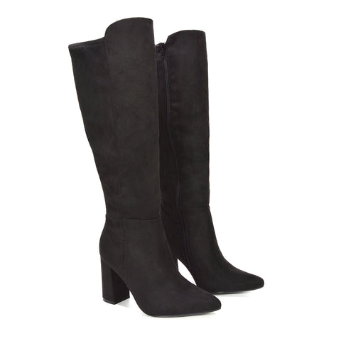 black boots for fall-to-winter transition, deep black winter fashion boots, dressy black long boots for formal looks, comfortable black knee boots with heel, timeless knee-high boot trend, fashionable tall boots for layering, elegant tall boots for special occasions, stylish knee high boots for fall and winter fashion,  winter dress boots for women