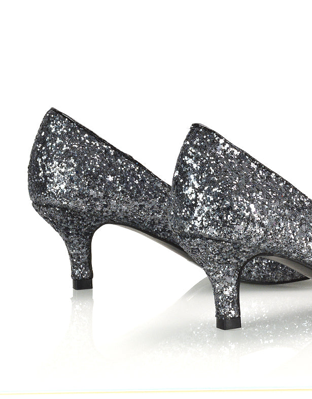 Elegant black glitter slip-on kitten heel court shoes in classic style, perfect for wedding, formal events, or everyday chic. Featuring comfortable low heels, these stylish and versatile shoes offer a sophisticated look for both professional and dressy occasions.