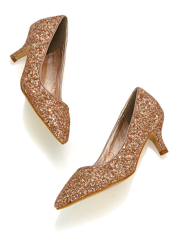 Elegant rose gold glitter slip-on kitten heel court shoes in classic style, perfect for wedding, formal events, or everyday chic. Featuring comfortable low heels, these stylish and versatile shoes offer a sophisticated look for both professional and dressy occasions.